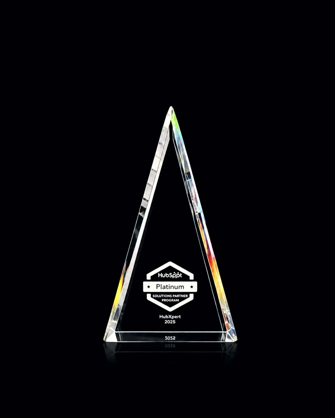 The HubSpot Platinum Solutions Partner award presented to HubXpert, 2025