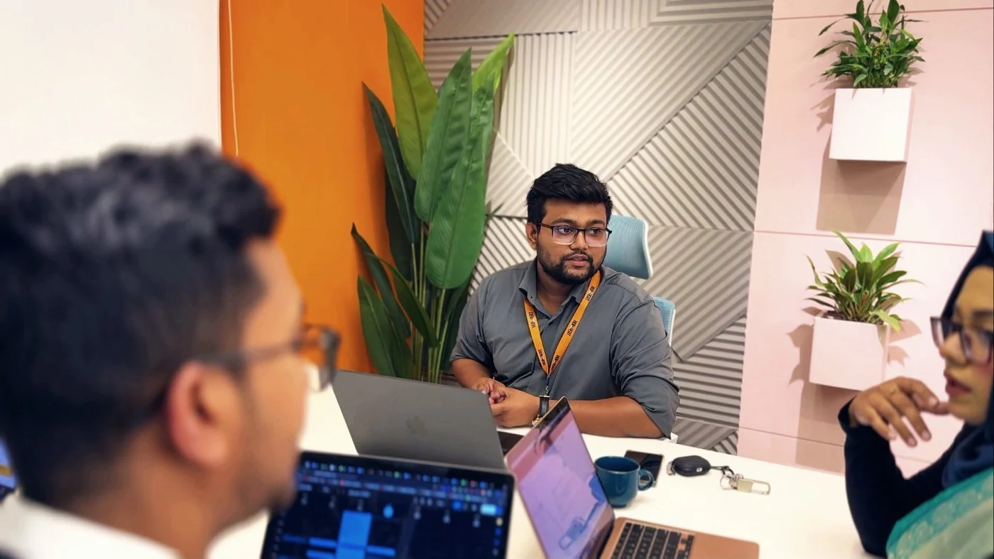 Ratul Rahman working with the HubXpert team